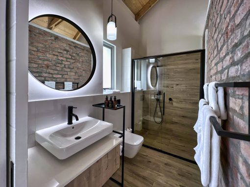 The Windhoek Luxury Suites Bathroom image
